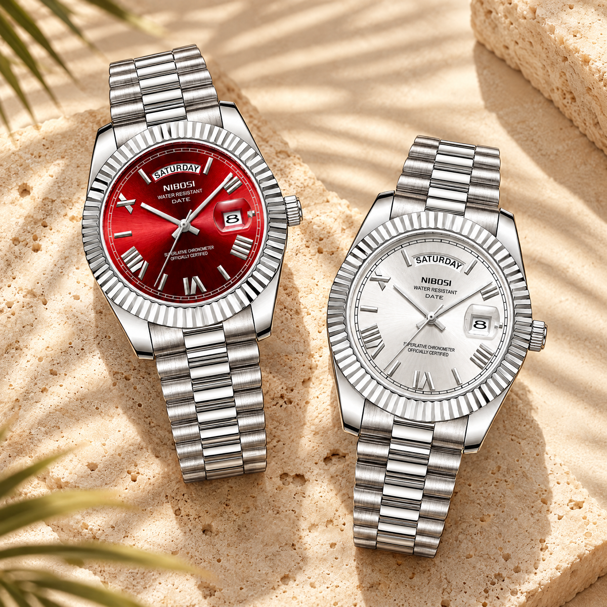 Red and silver day-date quartz watches together